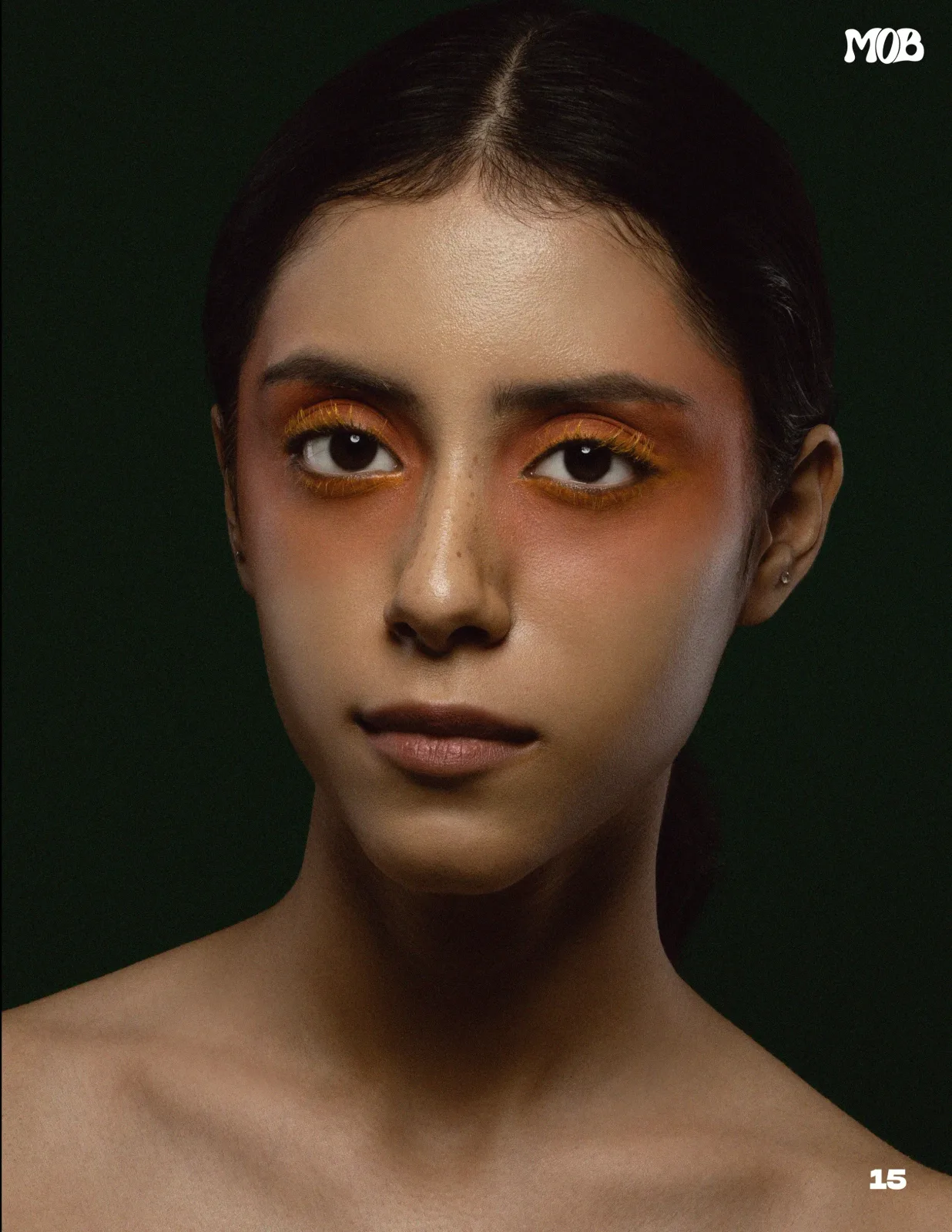 MOB Magazine "Soleil Écarlate" beauty close-up with orange eye makeup, photographed by Shreyak Singh