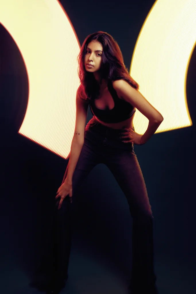 Studio fashion photograph with projected light shapes, photographed by Shreyak Singh