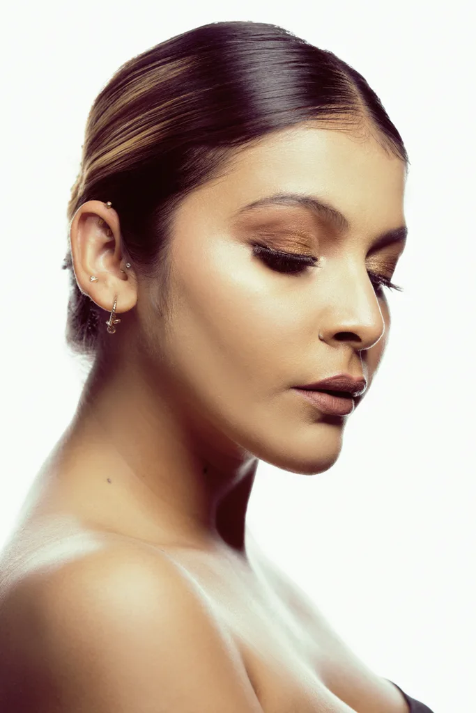 Beauty profile portrait with bronze makeup, photographed by Shreyak Singh