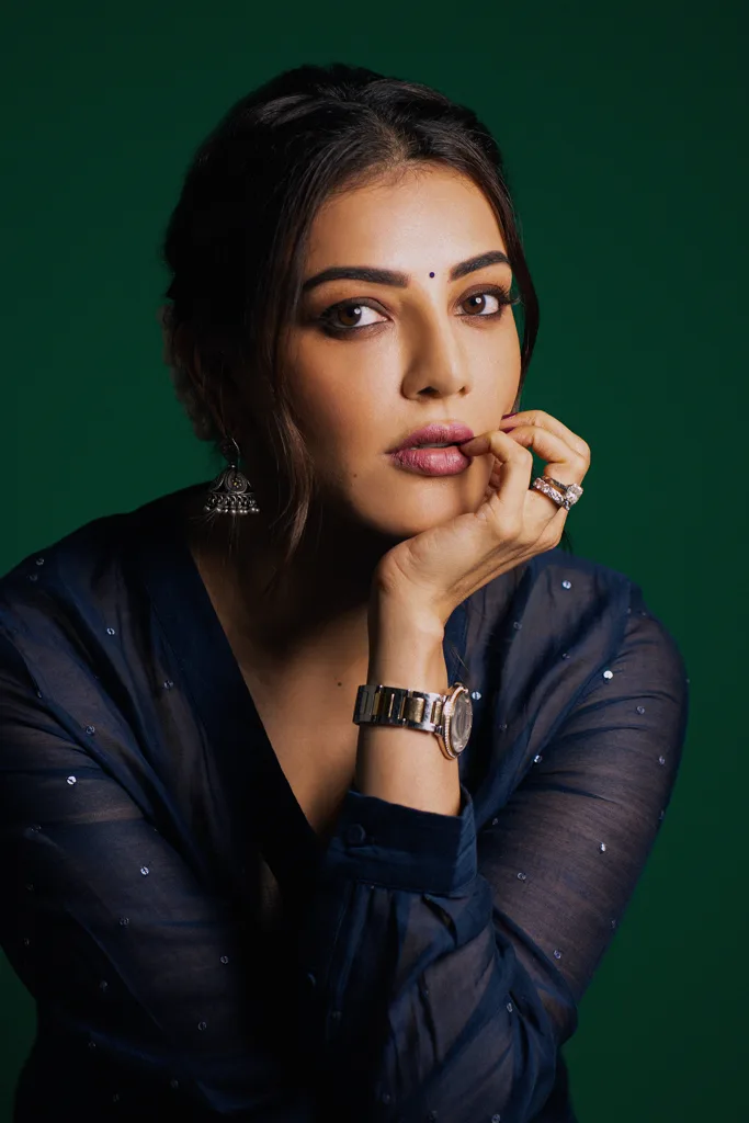 Portrait in a dark jacket against a green backdrop, photographed by Shreyak Singh