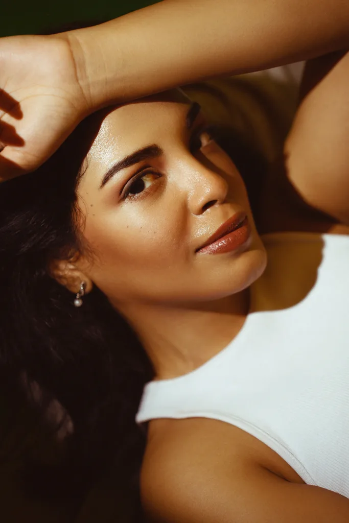 Beauty portrait in a white vest, photographed by Shreyak Singh