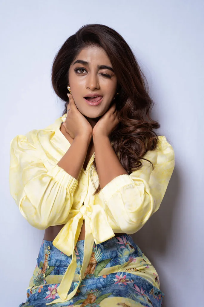 Fashion portrait in a yellow shirt and floral trousers, photographed by Shreyak Singh